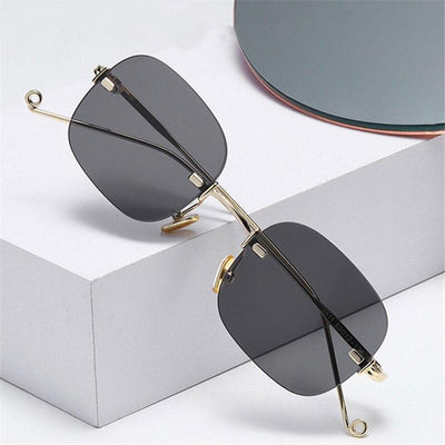 Vintage Punk Small Oval Metal Frame Classic Style Rimless Fashion Sunglasses For Men And Women-Unique and Classy